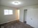 Bedroom with neutral carpet, bright window and closet space at 4530 Wichser Ct, Indianapolis, IN 46228