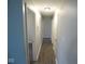 Hallway with neutral paint and luxury vinyl plank flooring at 4530 Wichser Ct, Indianapolis, IN 46228
