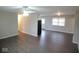 Open-concept living area with modern flooring and ample space, perfect for entertaining guests at 4530 Wichser Ct, Indianapolis, IN 46228