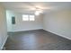 Spacious room featuring fresh paint and new flooring at 4530 Wichser Ct, Indianapolis, IN 46228