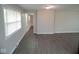 Living area with new flooring and fresh paint at 4530 Wichser Ct, Indianapolis, IN 46228