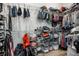 Organized walk-in closet with shelving, hanging racks, and storage bins for ample clothing and accessory space at 632 N Temple Ave, Indianapolis, IN 46201