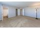 Spacious bedroom featuring neutral walls, plush carpeting, and multiple closets at 6513 Kingsbury Way, Zionsville, IN 46077