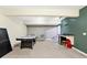 Basement featuring a pool table, kitchenette with a small bar, and comfortable seating for recreation and relaxation at 725 E County Rd 600 N, Pittsboro, IN 46167