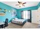 Vibrant bedroom featuring a ceiling fan and plenty of natural light from the window at 725 E County Rd 600 N, Pittsboro, IN 46167