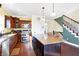 Modern kitchen with stainless steel appliances, a large island, and ample storage space at 725 E County Rd 600 N, Pittsboro, IN 46167