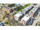 Aerial view of townhouses featuring contemporary design, well-maintained landscaping, and a modern aesthetic in an urban setting at 805 Switchyard Pl, Indianapolis, IN 46202