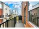 Balcony view with a glimpse of neighborhood features, showcasing modern townhouse architecture at 805 Switchyard Pl, Indianapolis, IN 46202