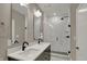 Stylish bathroom with double vanity, sleek fixtures, modern tile shower, and plenty of lighting at 805 Switchyard Pl, Indianapolis, IN 46202