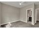 Bedroom with a plush carpet and a door leading to an adjacent bathroom at 805 Switchyard Pl, Indianapolis, IN 46202