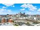 Enjoy a breathtaking panorama of the city skyline from this community, set against a backdrop of a bright blue sky at 805 Switchyard Pl, Indianapolis, IN 46202