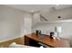 Well-lit office with wood desk, neutral tones and a comfortable workspace for productivity at 805 Switchyard Pl, Indianapolis, IN 46202