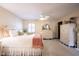 Bright bedroom with a white ceiling fan, white furniture, and beautiful decor creates a cozy, peaceful space at 8220 Traders Hollow Ct, Indianapolis, IN 46278