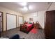Comfortable bedroom with two closets, recessed lighting, and stylish furniture at 8220 Traders Hollow Ct, Indianapolis, IN 46278