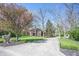 Long driveway leading to a beautiful home in a private, wooded setting at 8220 Traders Hollow Ct, Indianapolis, IN 46278