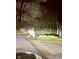 Deer in the front yard, with a mailbox and landscaping along the road at 8220 Traders Hollow Ct, Indianapolis, IN 46278