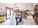 Open-concept kitchen with granite countertops, stainless steel appliances, and a dining area with french doors to the outside at 8220 Traders Hollow Ct, Indianapolis, IN 46278