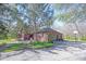 Side view of a brick home with an attached two-car garage at 8220 Traders Hollow Ct, Indianapolis, IN 46278