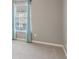 Bedroom showcases plush carpeting and large window covered by light blue curtains at 8233 Katrina Way, Fishers, IN 46038