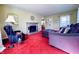 Comfortable living room featuring ample seating and a charming fireplace feature at 850 N Butler Ave, Indianapolis, IN 46219