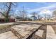 View of the expansive backyard with mature trees and an open space at 866 W 29Th St, Indianapolis, IN 46208