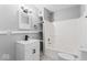 Modern bathroom with vanity, mirror, shelves, and shower-tub combination at 866 W 29Th St, Indianapolis, IN 46208