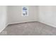 Bright bedroom featuring carpeted floors and a window at 866 W 29Th St, Indianapolis, IN 46208