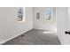 Bedroom featuring carpeted floors and natural light from the windows at 866 W 29Th St, Indianapolis, IN 46208