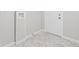 This laundry room features tile floors and connections for a washer and dryer at 866 W 29Th St, Indianapolis, IN 46208