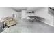 Finished basement with ping pong table, gray carpet, and neutral paint at 1040 Arthur Ct, Greenfield, IN 46140