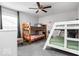bedroom with two sets of bunkbeds and ceiling fan at 1040 Arthur Ct, Greenfield, IN 46140