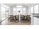 Bright dining room filled with natural light featuring large windows and a spacious table at 1040 Arthur Ct, Greenfield, IN 46140