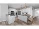 Modern kitchen with white cabinets, stainless steel appliances, and granite countertops at 1040 Arthur Ct, Greenfield, IN 46140