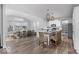 Open concept kitchen featuring island with seating and an adjacent dining area with ample natural light at 1040 Arthur Ct, Greenfield, IN 46140