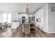 Stylish kitchen featuring white cabinets, granite countertops, and hardwood floors at 1040 Arthur Ct, Greenfield, IN 46140