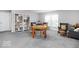 Inviting living area with an open floor plan, filled with natural light and neutral colors at 1040 Arthur Ct, Greenfield, IN 46140