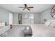 Cozy main bedroom with a comfortable seating area and decor that creates a relaxing atmosphere at 1040 Arthur Ct, Greenfield, IN 46140