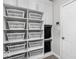 Custom storage solution with built-in shelving and baskets, offering ample space at 1040 Arthur Ct, Greenfield, IN 46140