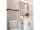 Elegant bathroom features white vanity, marble countertops, and modern fixtures at 1041 S State Ave, Indianapolis, IN 46203