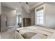 Bright bedroom featuring a window, ceiling fan, carpet, and wardrobe at 1041 S State Ave, Indianapolis, IN 46203