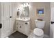 Bright bathroom with white fixtures, clean lines, and modern accents at 113 Edgewater Dr, Noblesville, IN 46062