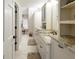 A bathroom features double sink vanity, granite countertops, and custom cabinets at 113 Edgewater Dr, Noblesville, IN 46062