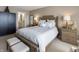 Comfortable main bedroom featuring a plush bed, neutral décor, and ample natural light at 113 Edgewater Dr, Noblesville, IN 46062