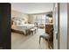 Serene main bedroom with plantation shutters, a plush bed, and neutral décor at 113 Edgewater Dr, Noblesville, IN 46062