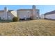 Backyard featuring green space, a patio and well-maintained lawn at 11624 Eldridge Dr, Indianapolis, IN 46235