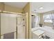 Bathroom with a shower, soaking tub and view of the closet area at 11624 Eldridge Dr, Indianapolis, IN 46235