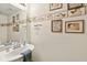 Bathroom featuring decorative walls and artwork at 11624 Eldridge Dr, Indianapolis, IN 46235