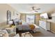 Cozy bedroom with a large bed, neutral colors, and plenty of natural light at 11624 Eldridge Dr, Indianapolis, IN 46235