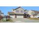 Charming two-story home with a three-car garage and well-maintained front yard at 11624 Eldridge Dr, Indianapolis, IN 46235