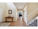 Open foyer featuring hardwood floors, stairway and neutral wall colors at 11624 Eldridge Dr, Indianapolis, IN 46235